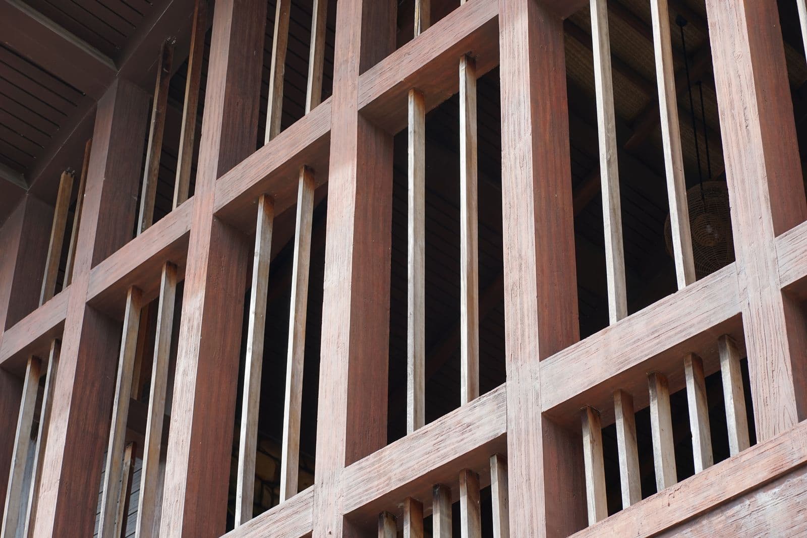 Wooden facade with vertical timber beams